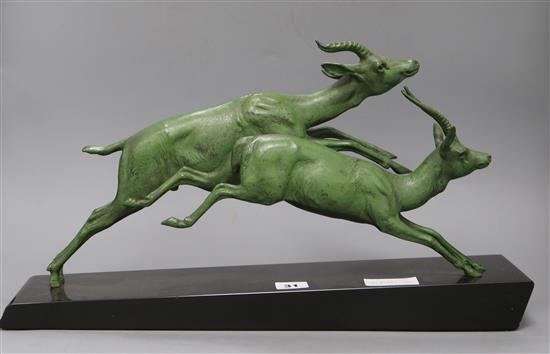 An Art Deco model of antelope, signed Plagnet length 51cm